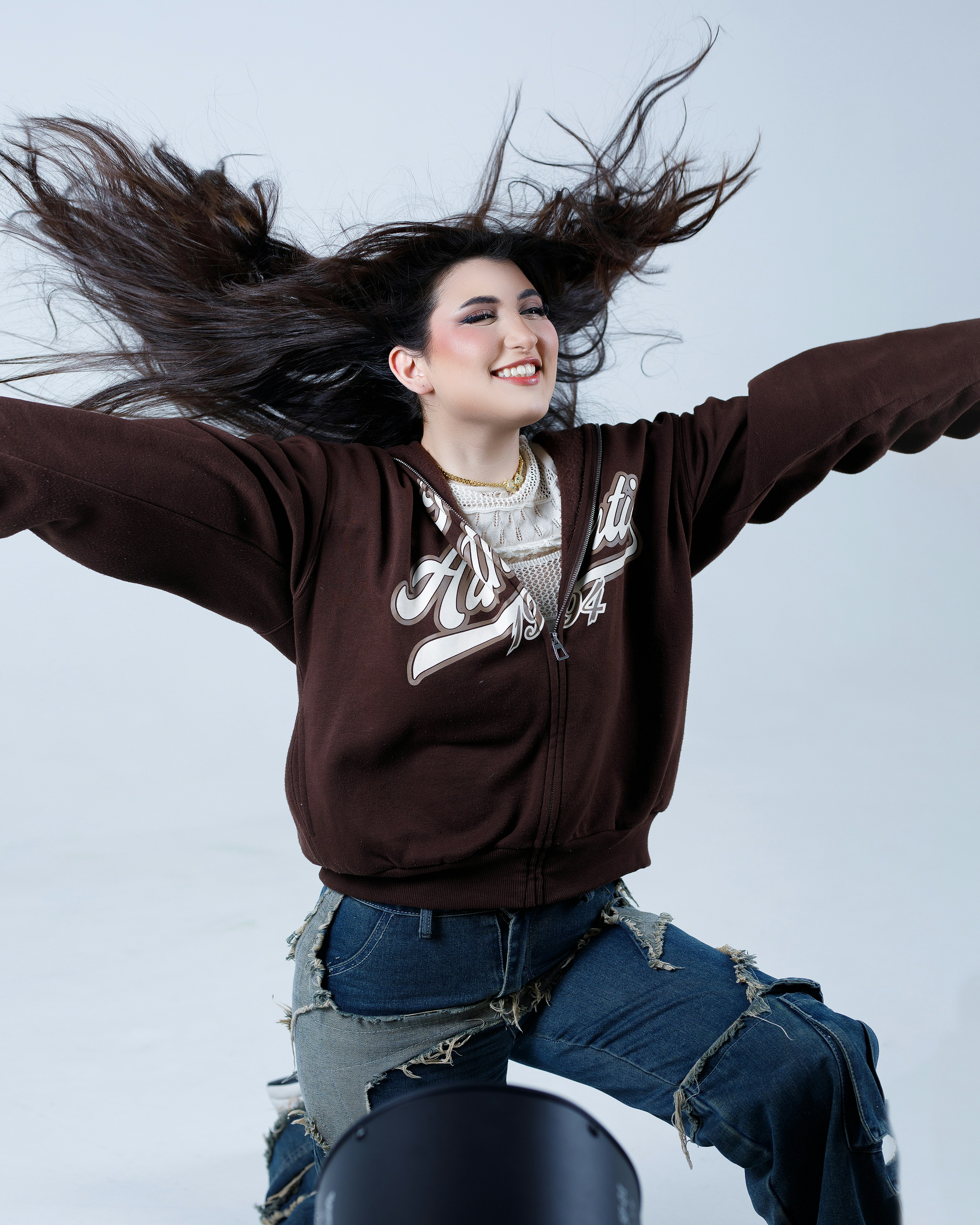 A woman with her hair flying in the air photo – Free Followers Image on ...
