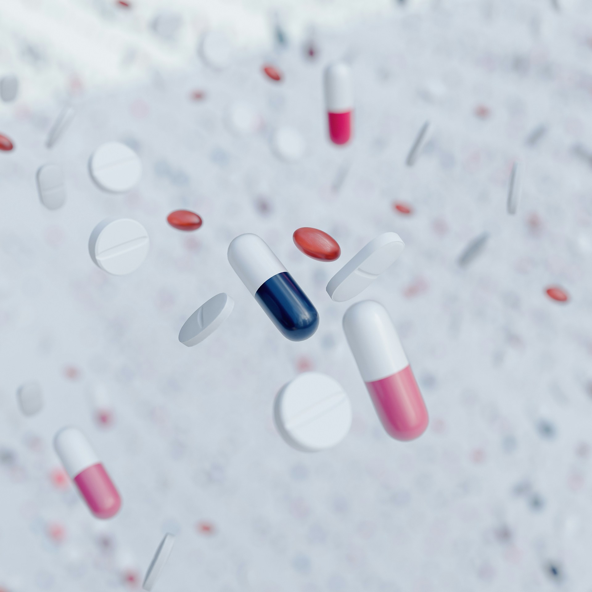 A group of pills flying through the air