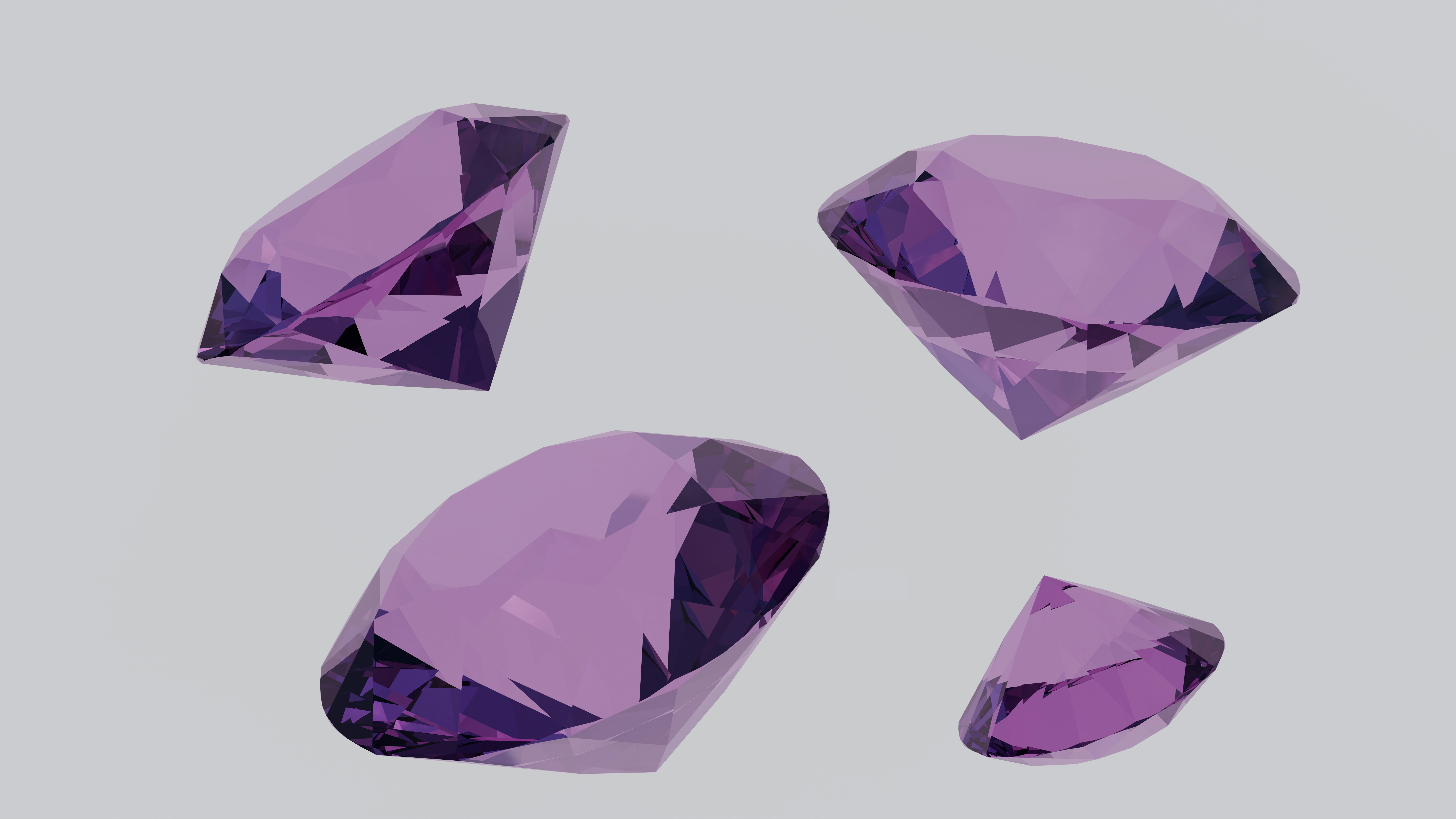A group of purple diamonds sitting on top of a table