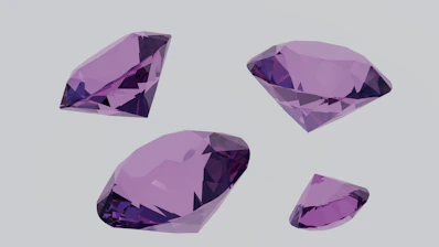A group of purple diamonds sitting on top of a table