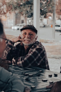 A group of people sitting around a table