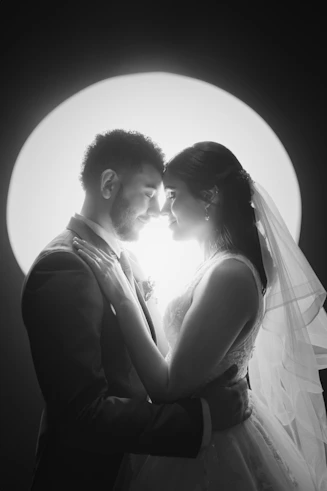 A man and a woman standing next to each other