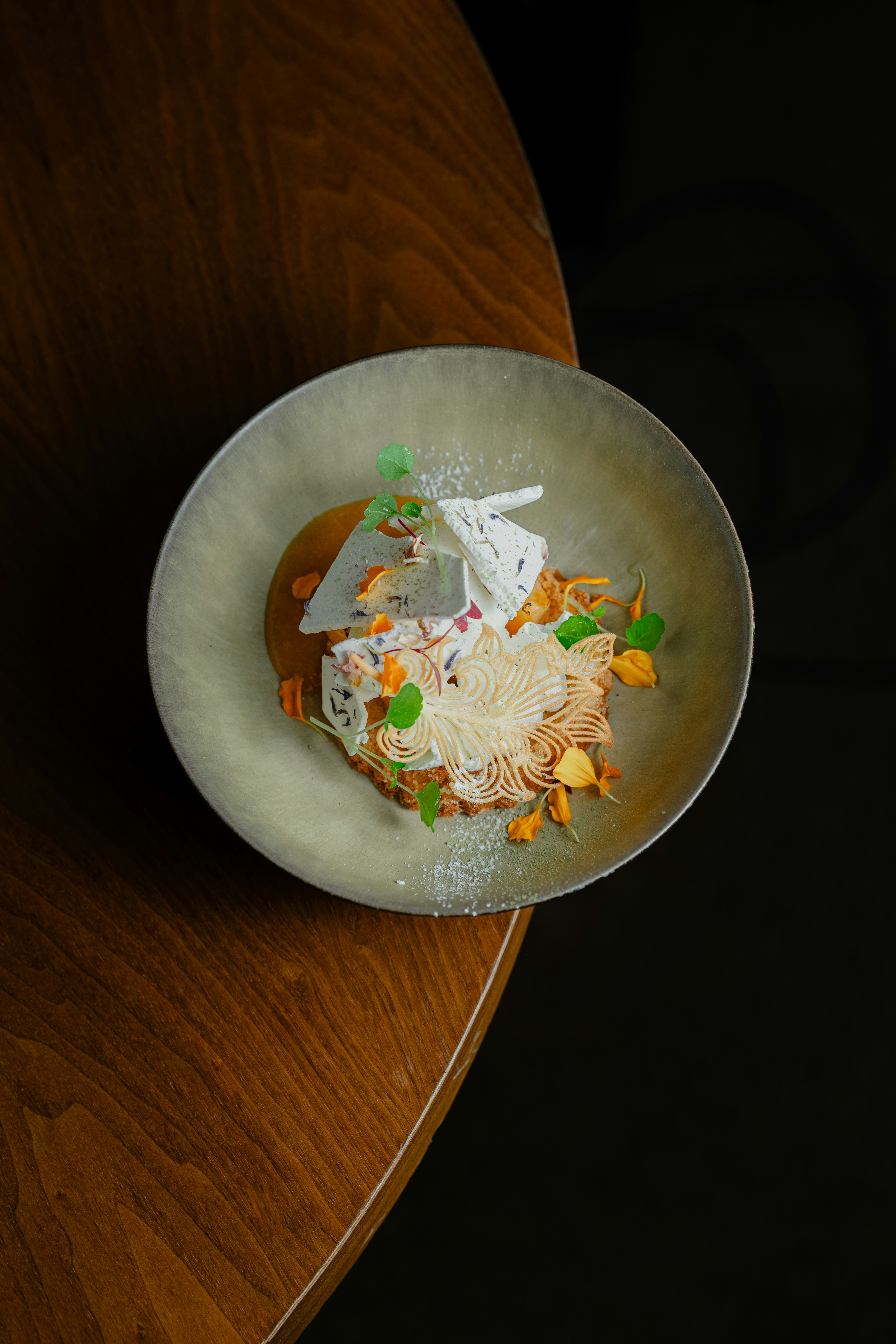 A bowl of food on a wooden table