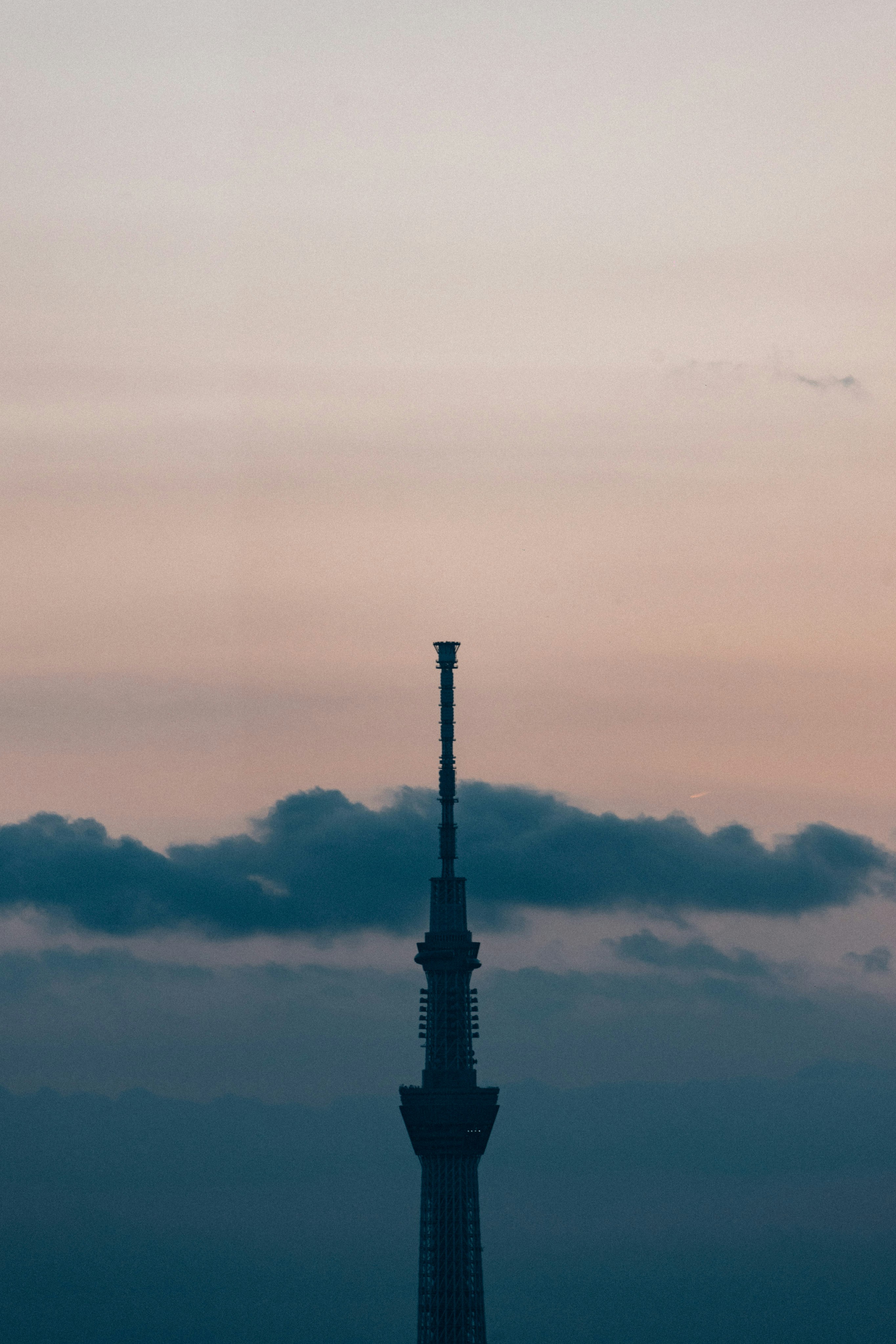 A tall tower with a sky in the background photo – Free Tower Image on ...