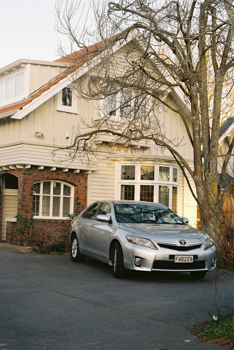 Car parked in front of a house
