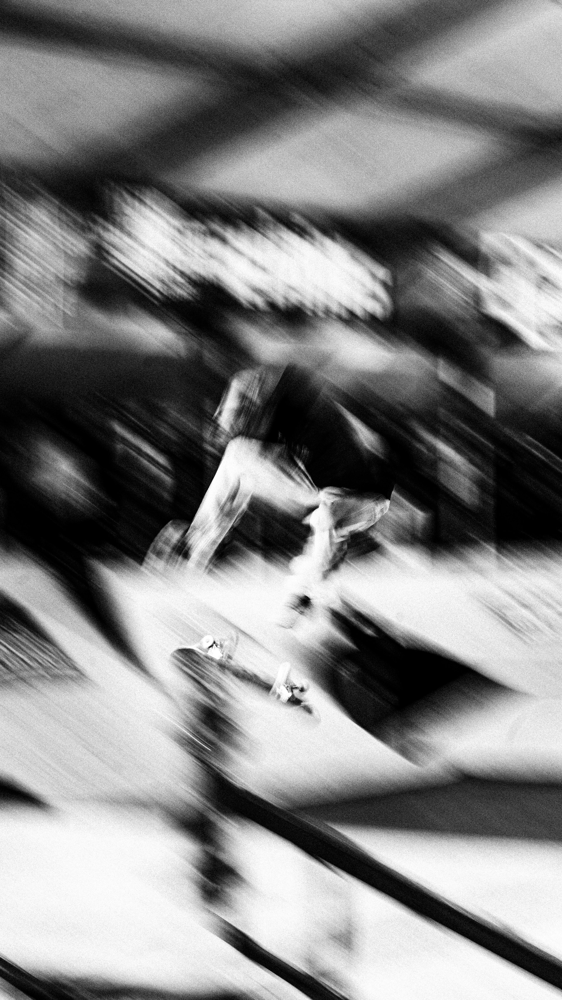 A blurry photo of a person on skis