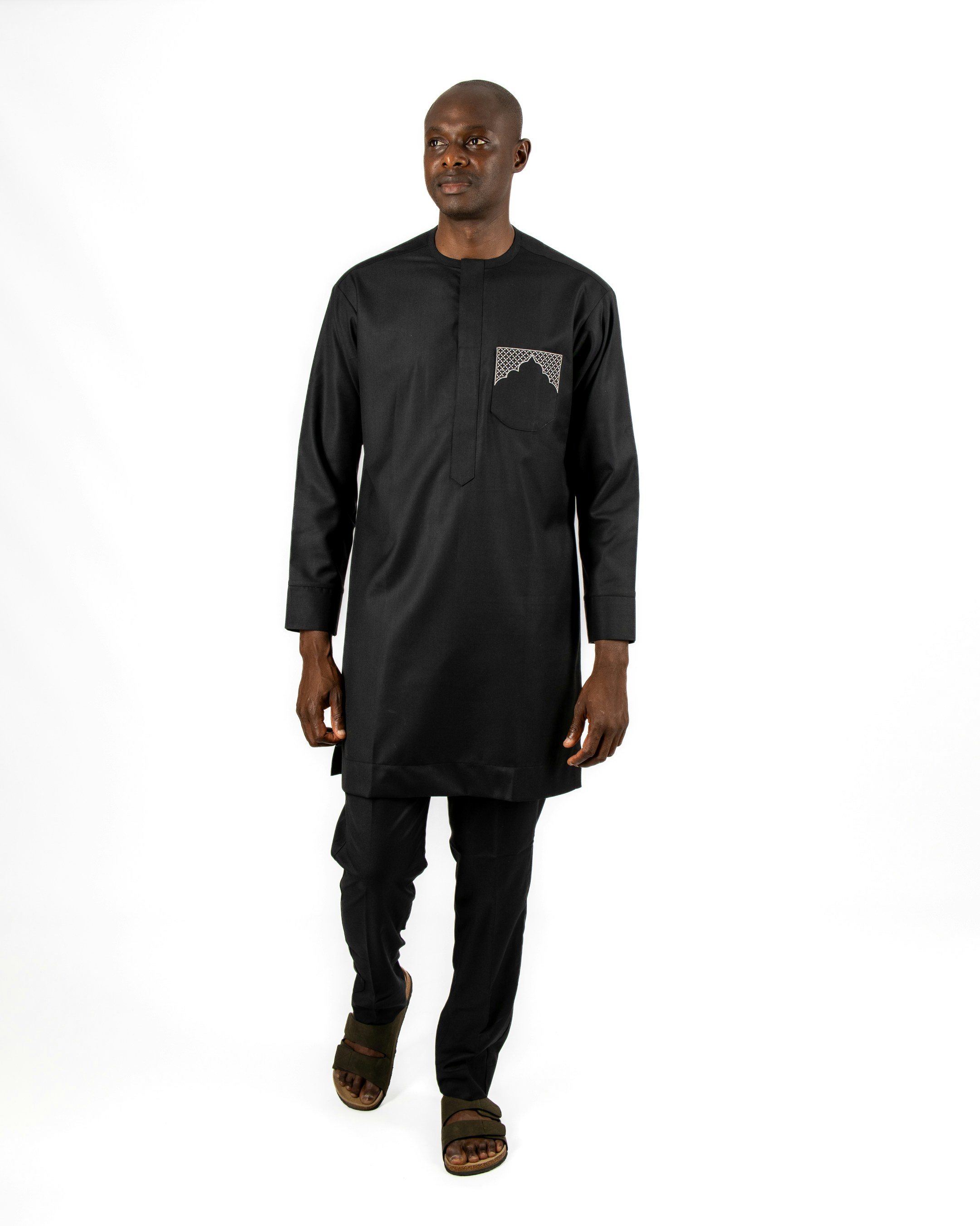 woman wearing yellow long-sleeved dress under white clouds and blue sky during daytime