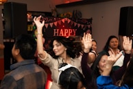 A group of people standing around each other