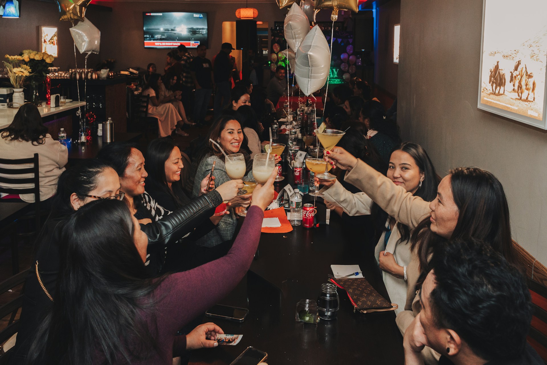 A group of people sitting around a table