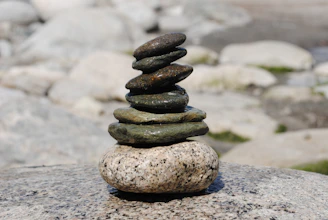 A stack of rocks sitting on top of a rock