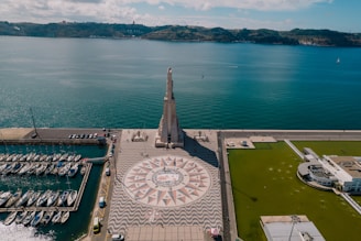 An aerial view of a marina with boats in the water