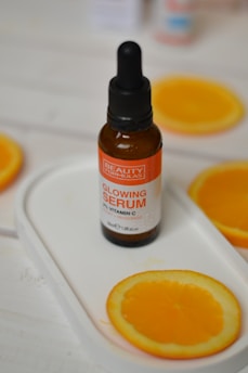 A bottle of orange juice sitting on top of a tray