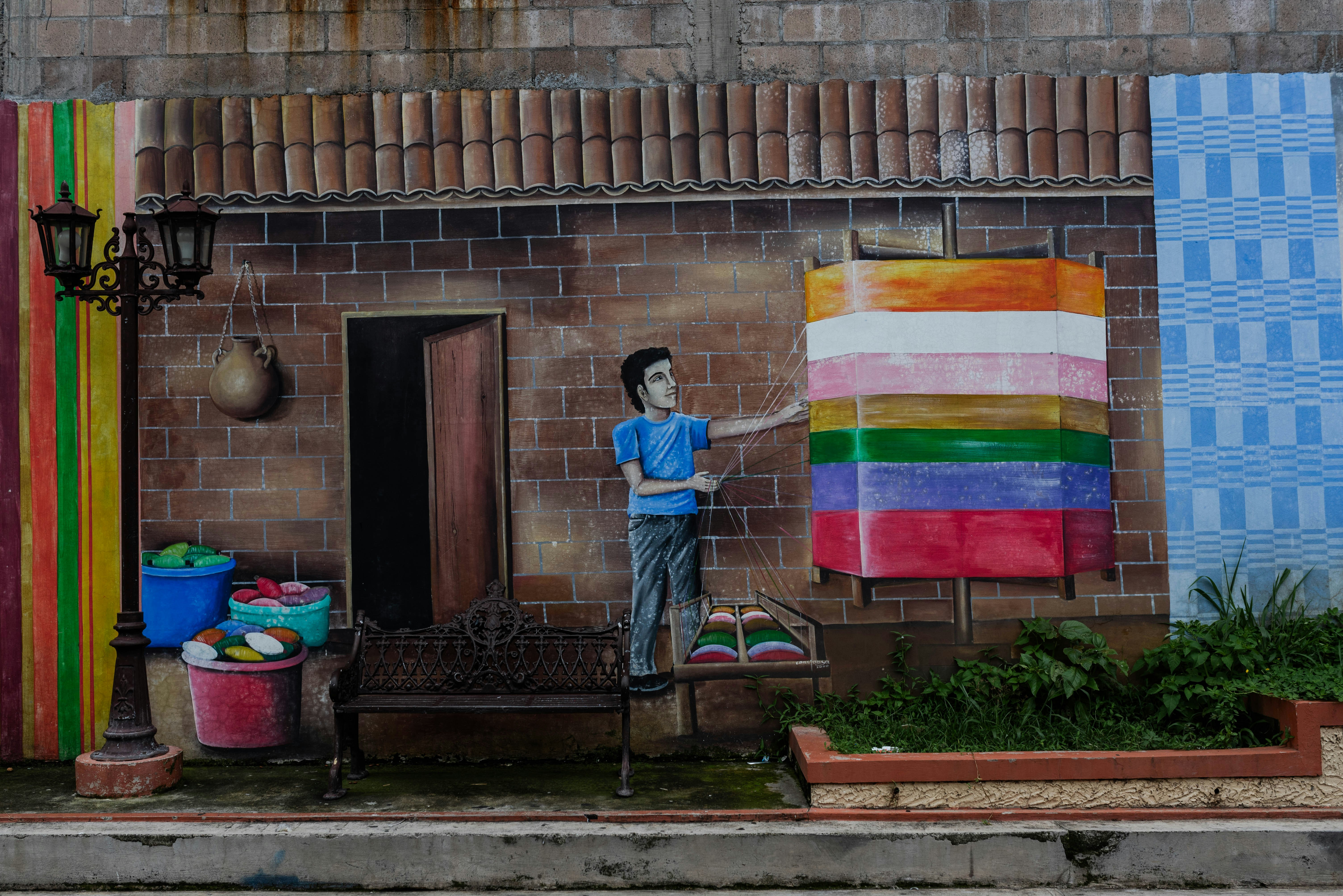 A painting of a man standing in front of a building