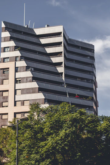 A tall building with a lot of windows on top of it