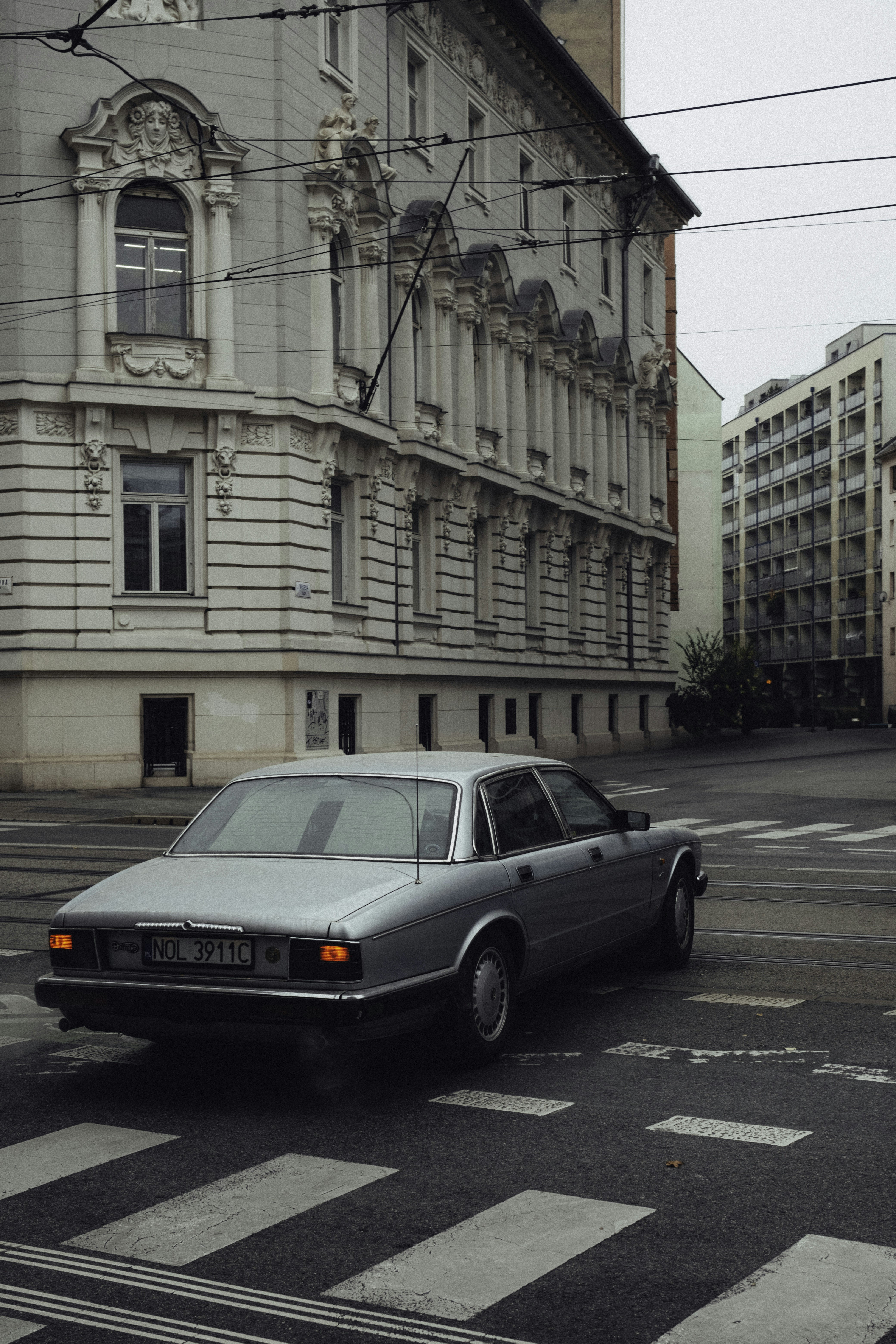 A car that is sitting in the street