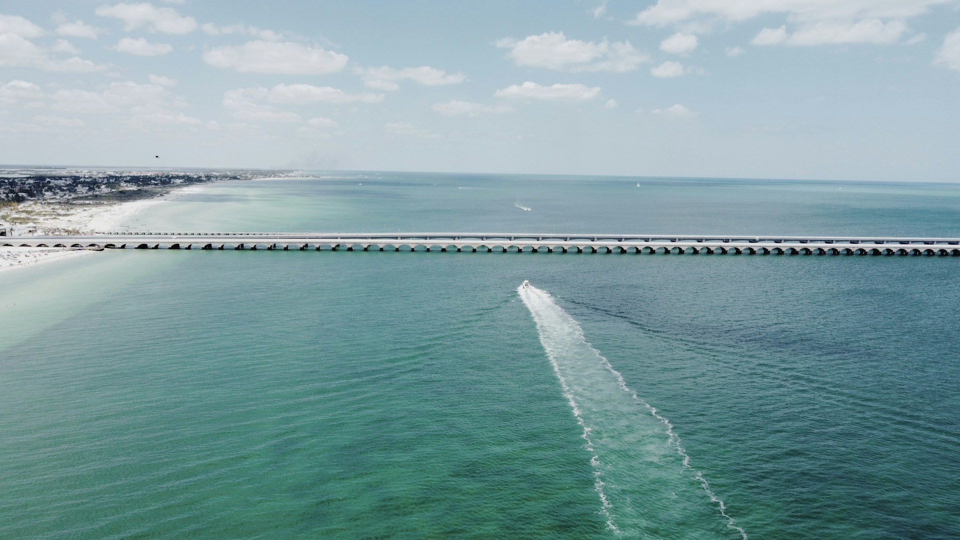 A boat traveling across a large body of water