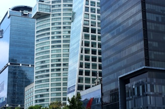 A group of tall buildings sitting next to each other