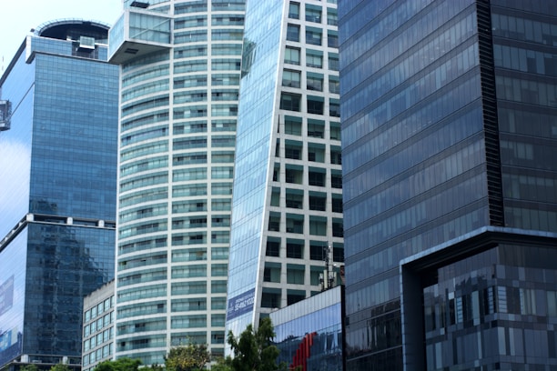 A group of tall buildings sitting next to each other