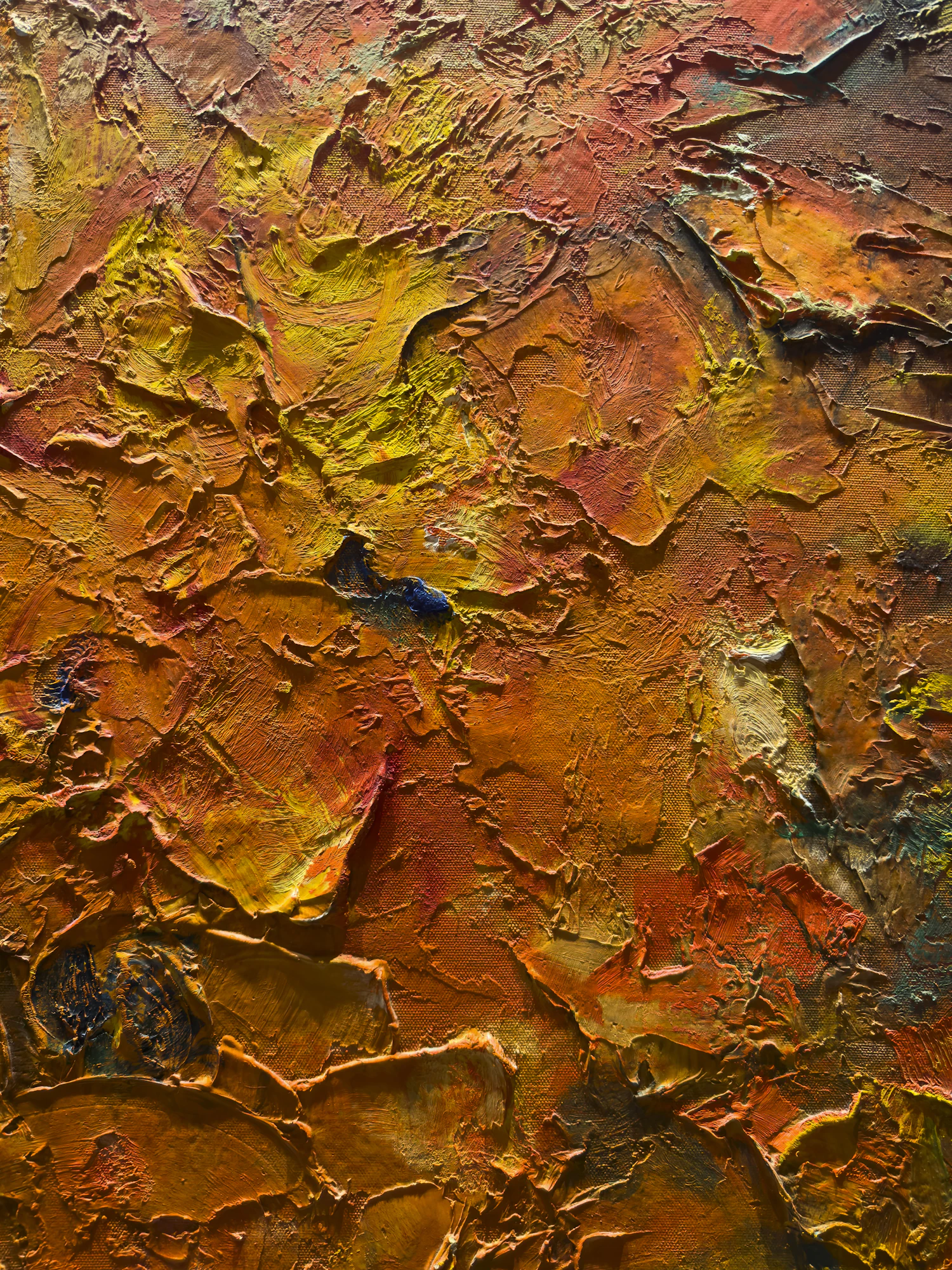 Ochre relief painting photographed flat on the depot bench before it goes out