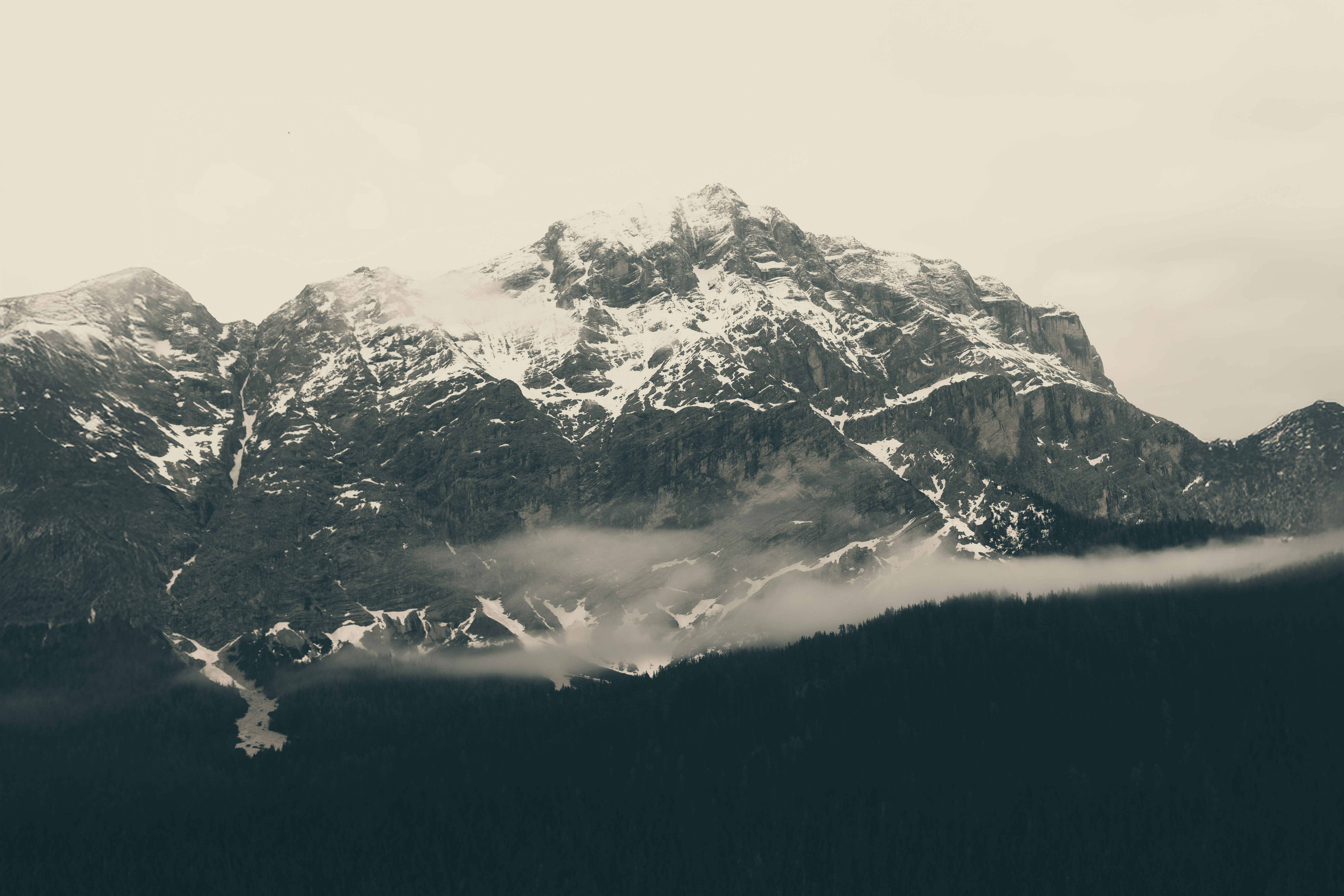 A black and white photo of a mountain range