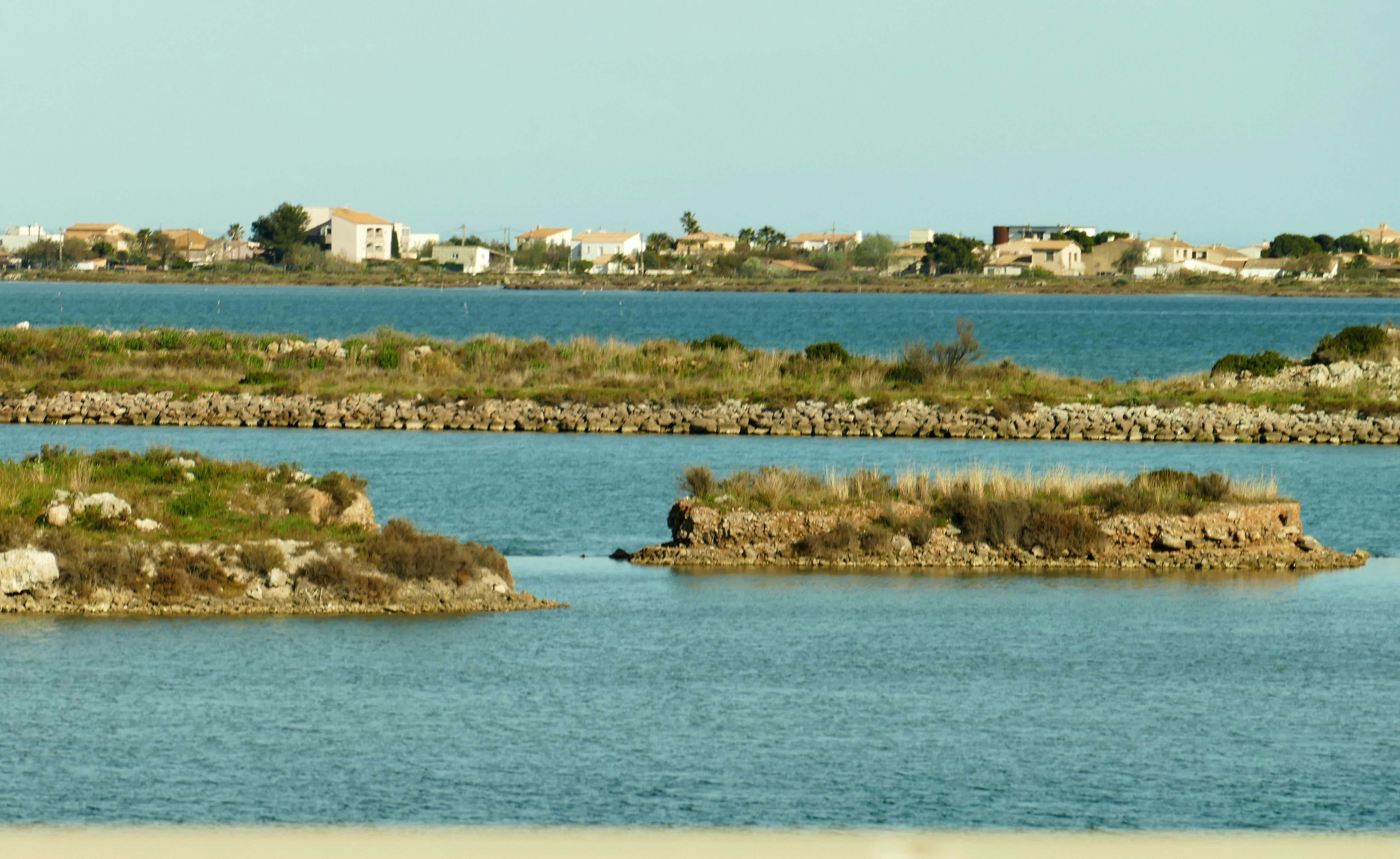 A large body of water surrounded by land