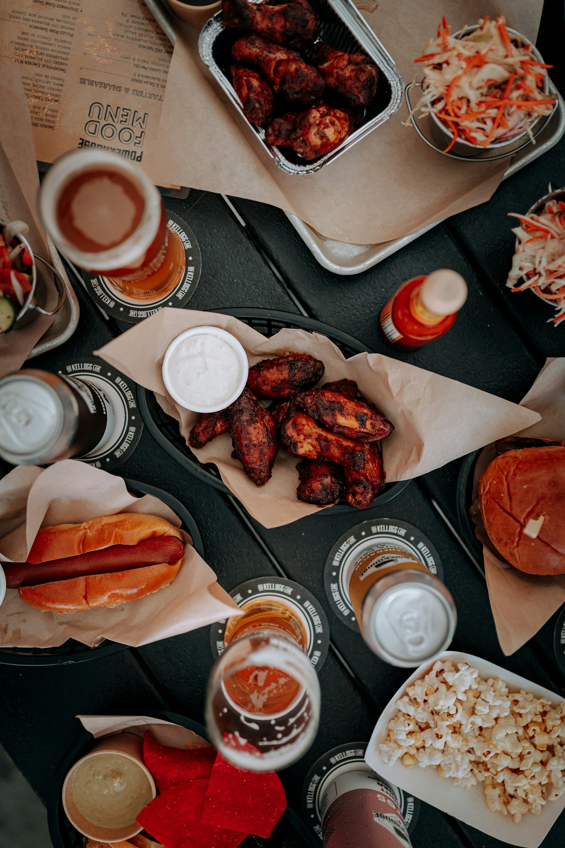 A table topped with lots of food and drinks