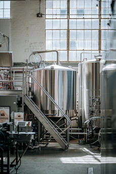 A large room filled with lots of metal tanks