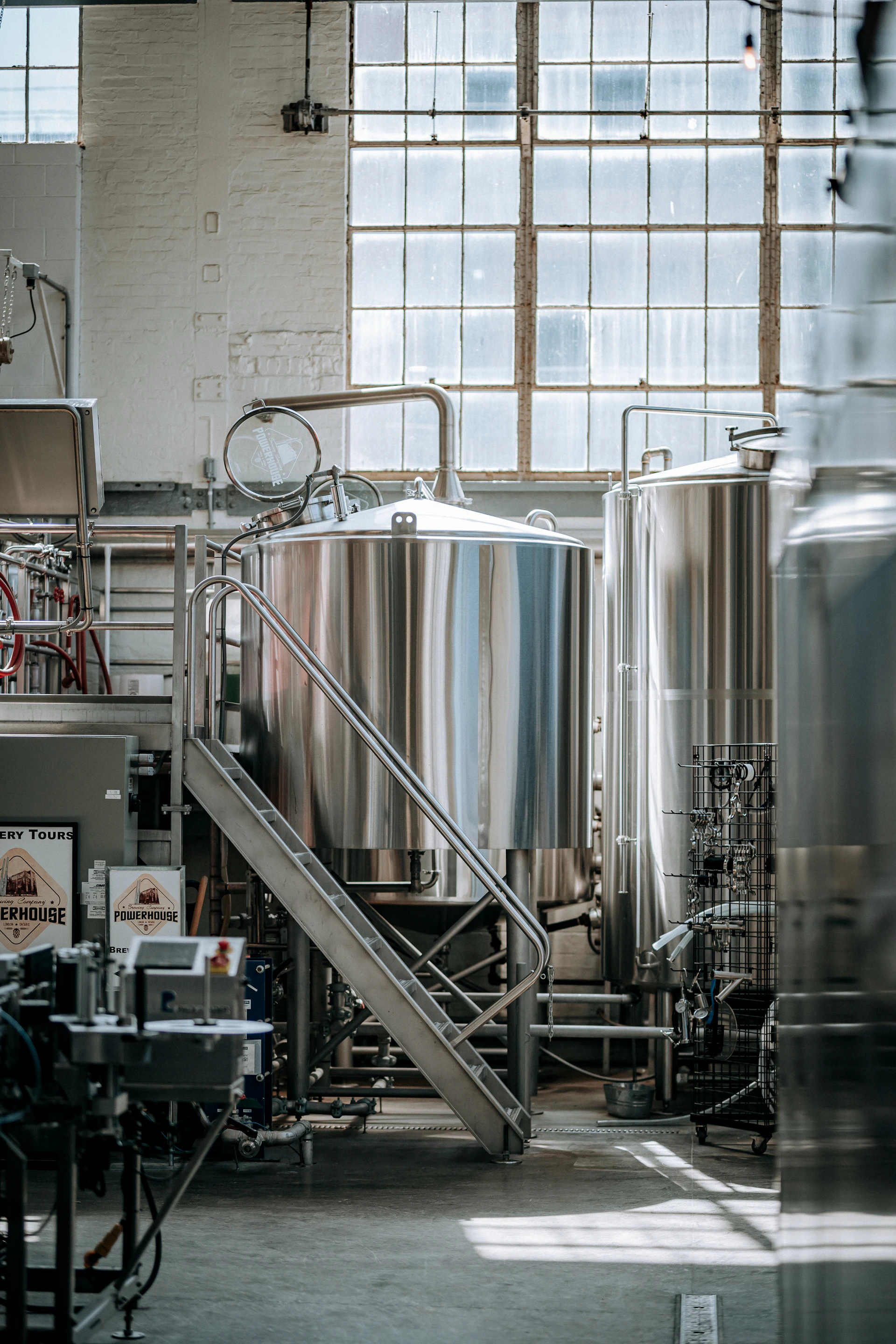 Stainless steel fermentation tanks in the brewhouse