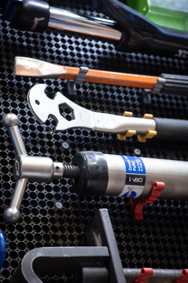 Tools on a rack used for Grundfos well pump repair in rural Atascosa County