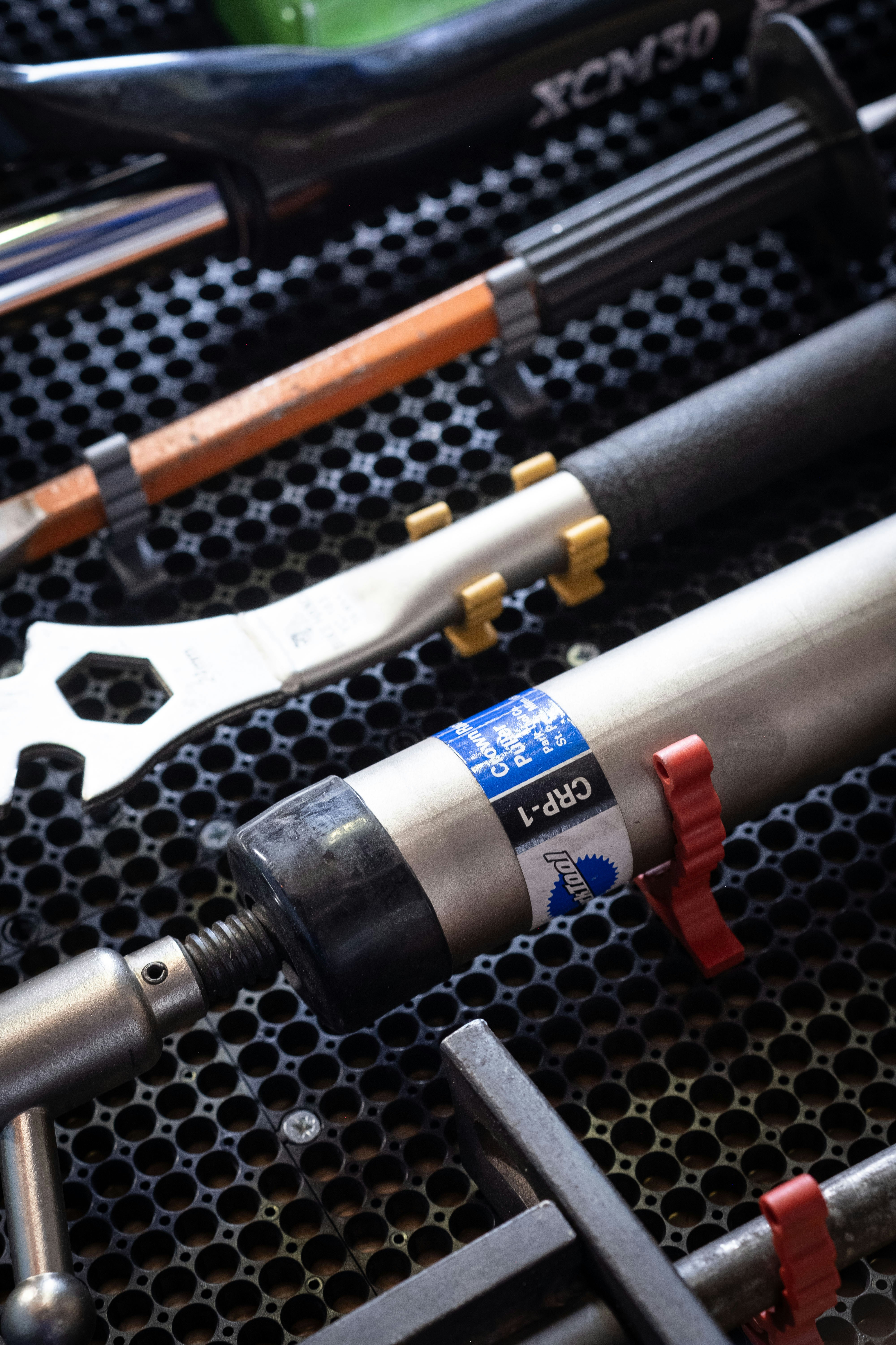 A bunch of tools that are on a rack