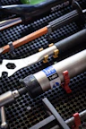 A bunch of tools that are on a rack
