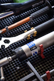 A bunch of tools that are on a rack