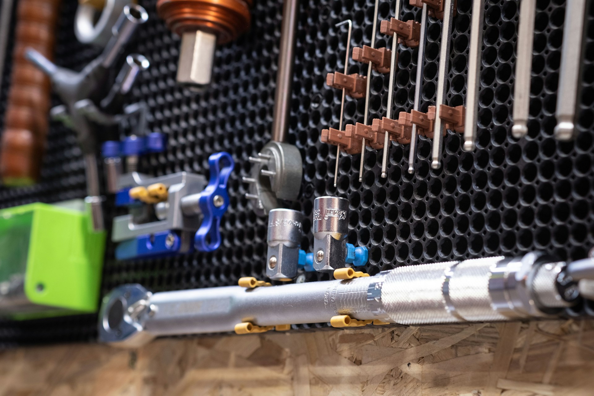 A close up of a machine with tools attached to it