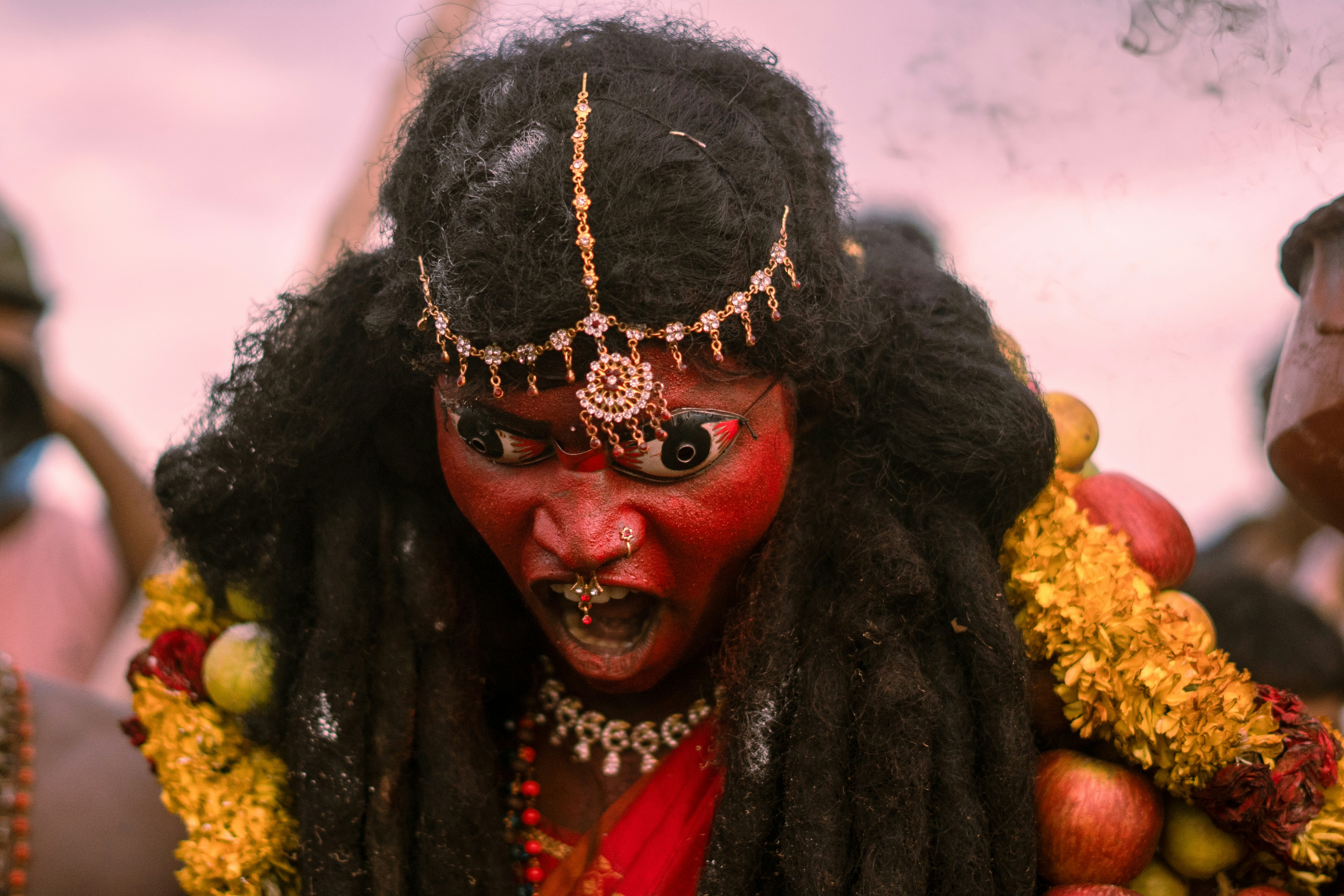 Tuticorin, India - The emotions in the image go beyond the human realm, suggesting the individual has transcended their identity to channel a divine or mythological force. This transformation often evokes awe and fascination, as it symbolizes the merging of human and divine. The image’s emotions are primal, spiritual, and visceral, capturing the powerful essence of rituals where human and divine energy collide, leaving the viewer feeling a mix of reverence, fear, and awe