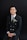 A man in a suit and tie posing for a picture