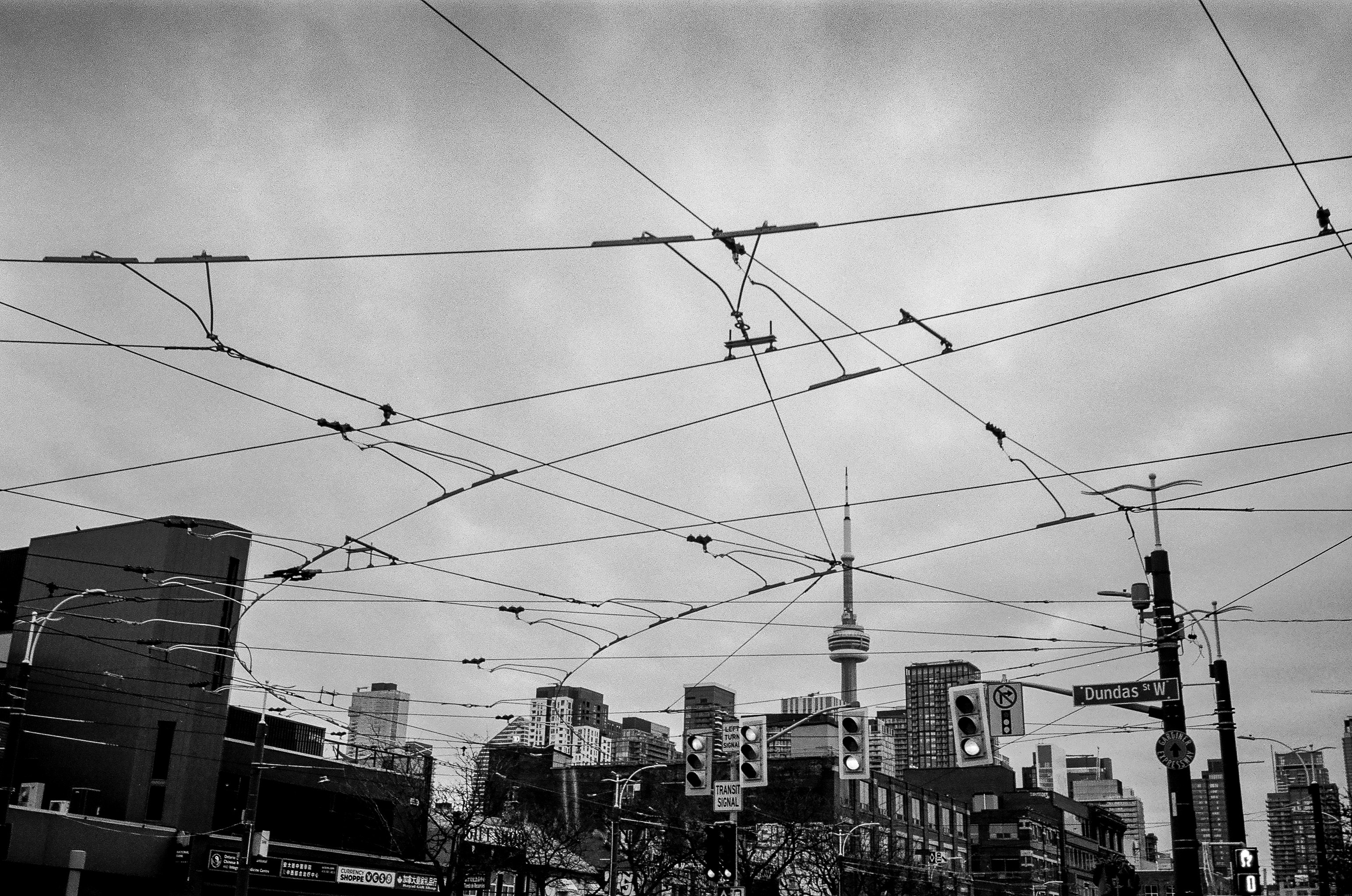 A black and white photo of a city street