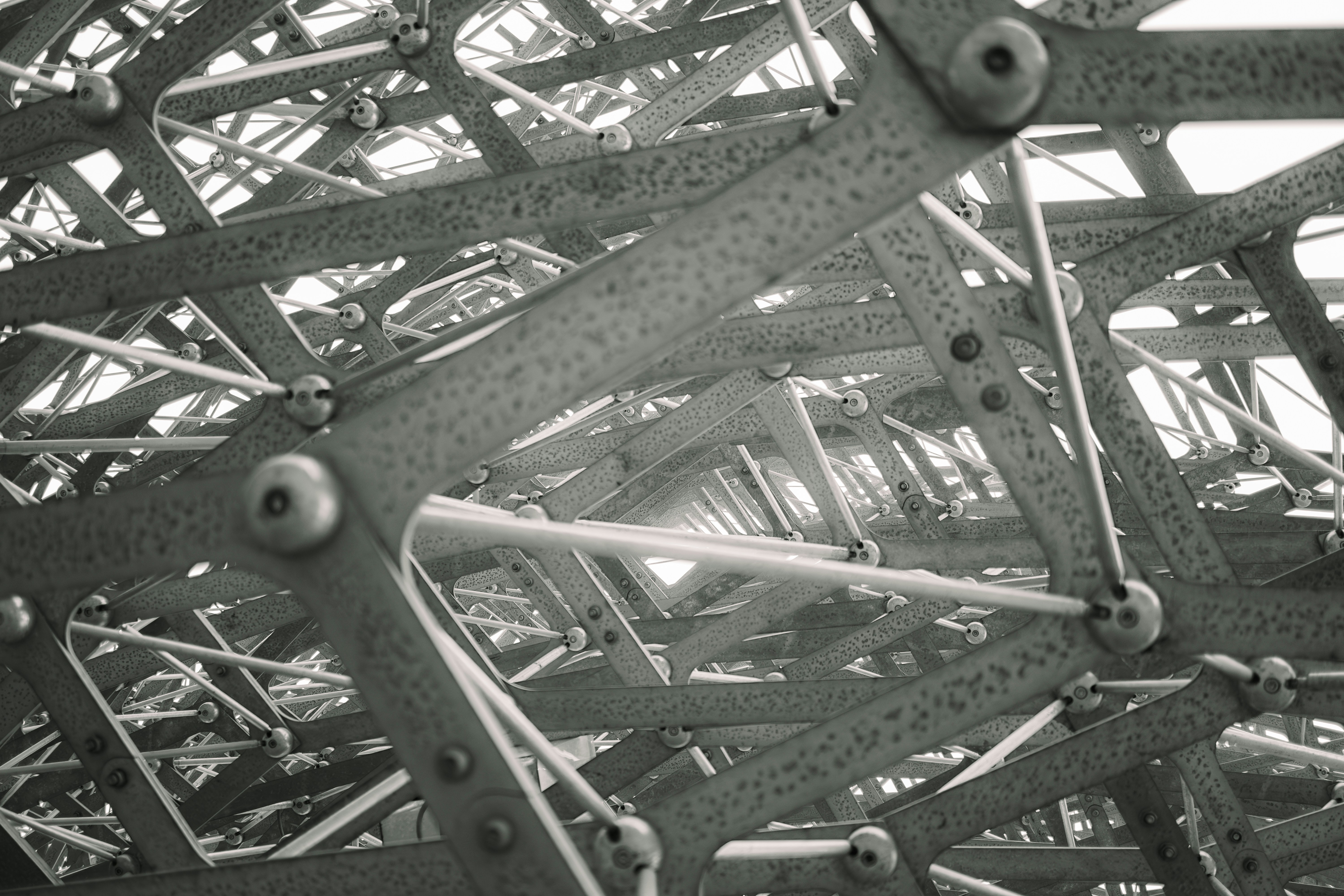 A black and white photo of a metal structure