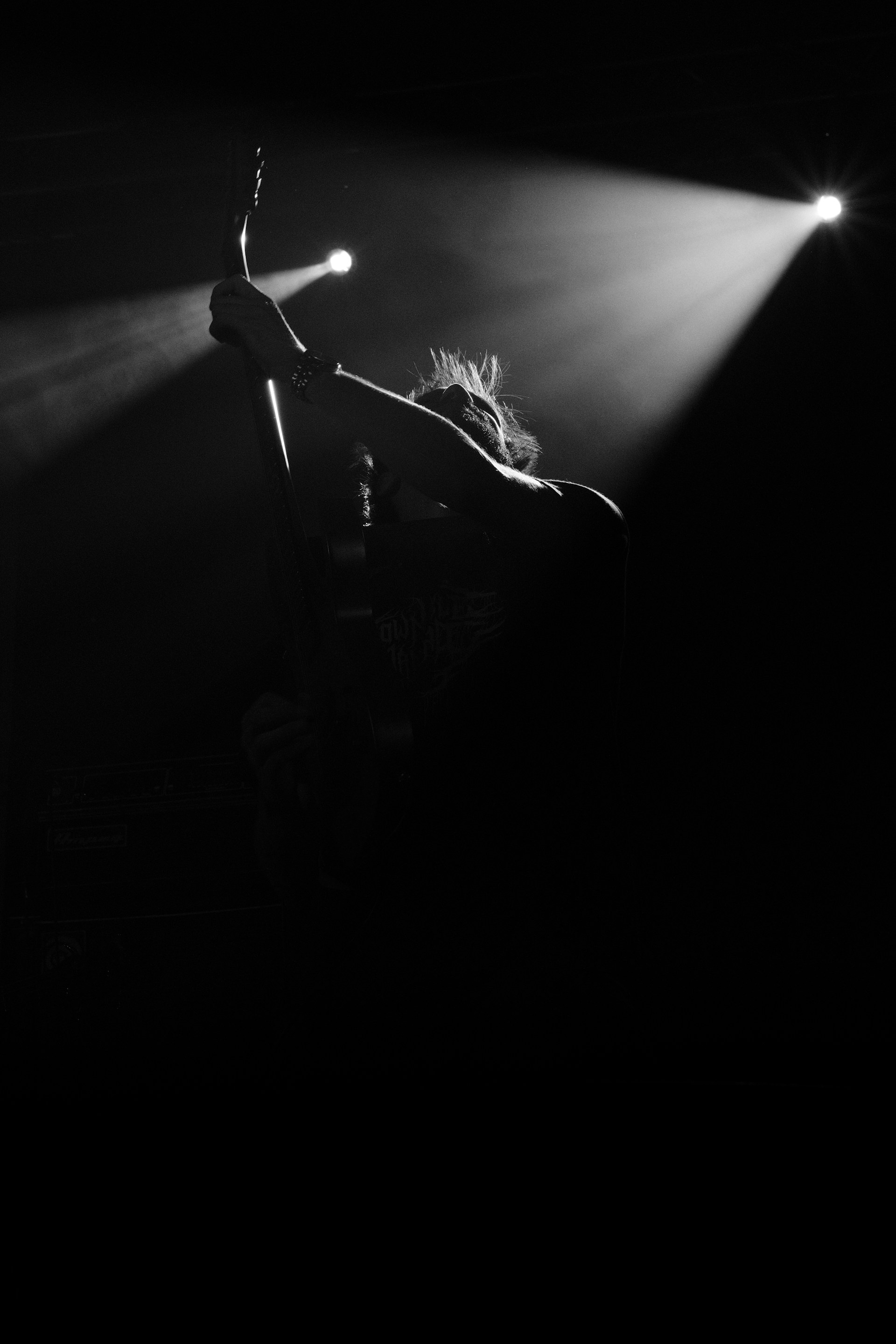 A person on a stage with a microphone