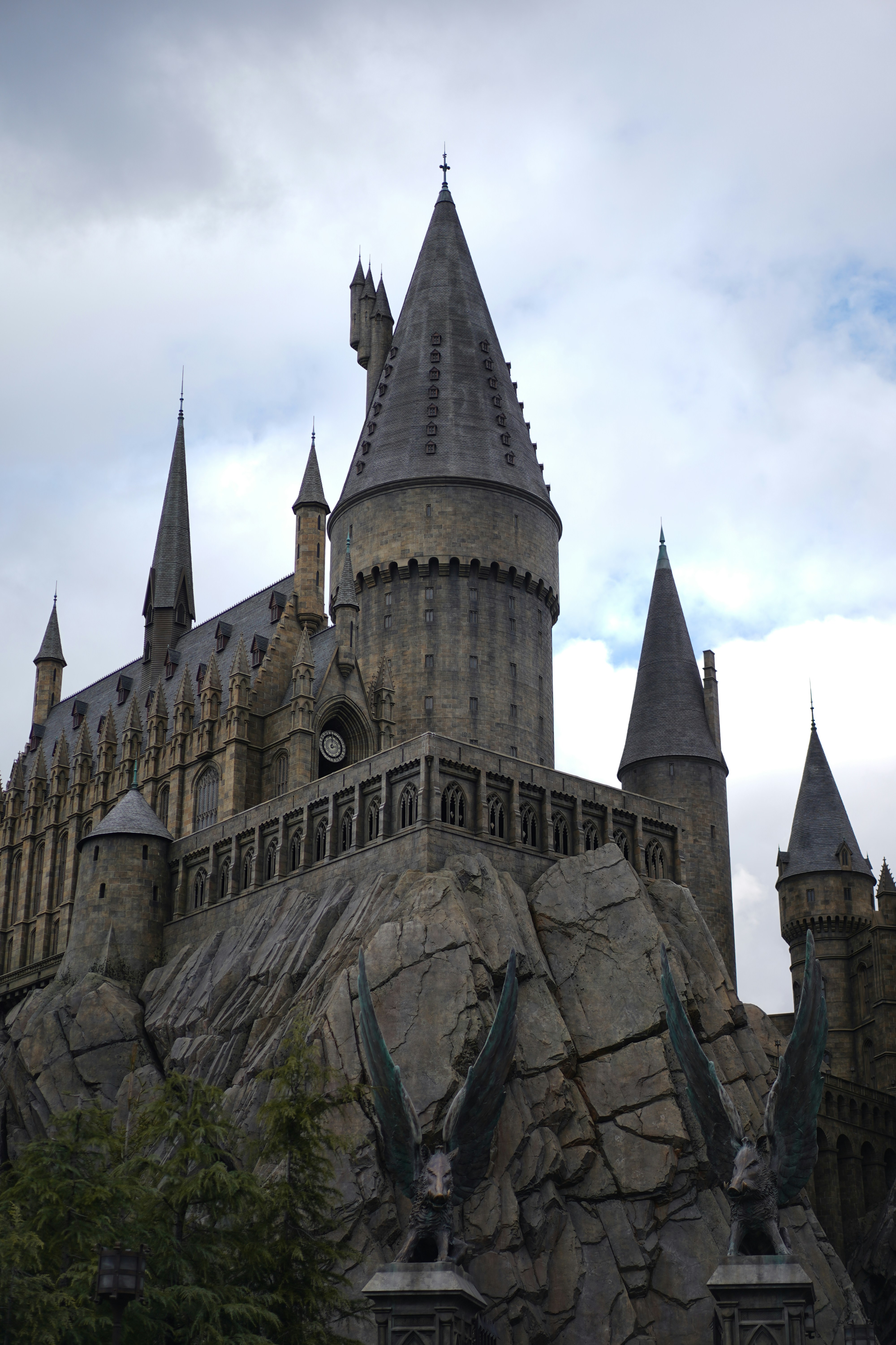 A castle made of rocks with a clock on it