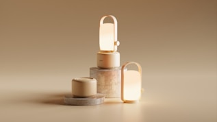 A couple of candles sitting on top of a table
