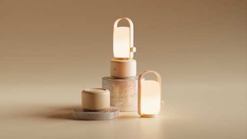 A couple of candles sitting on top of a table