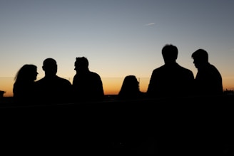 A group of people standing next to each other