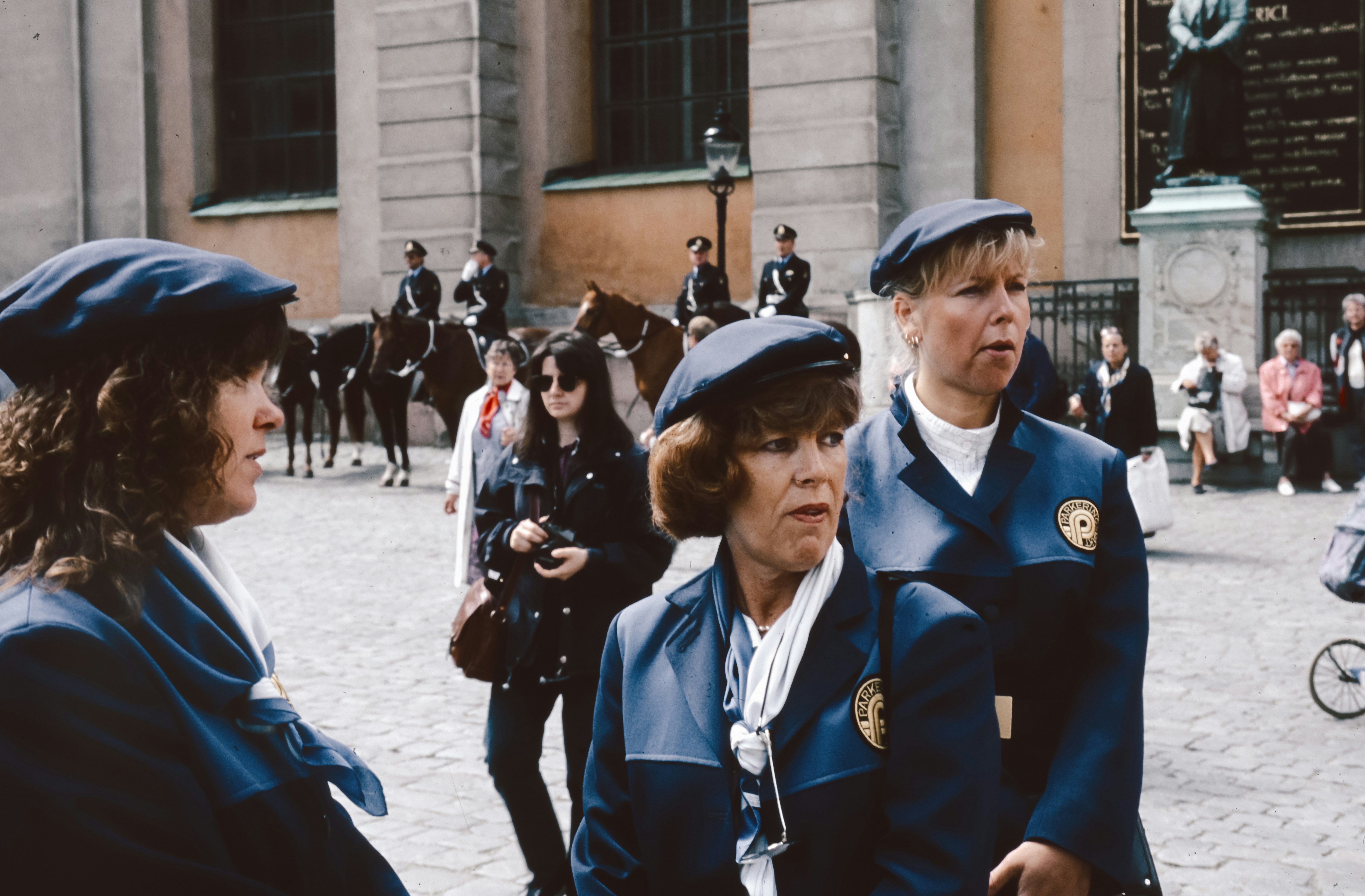A group of women standing next to each other
