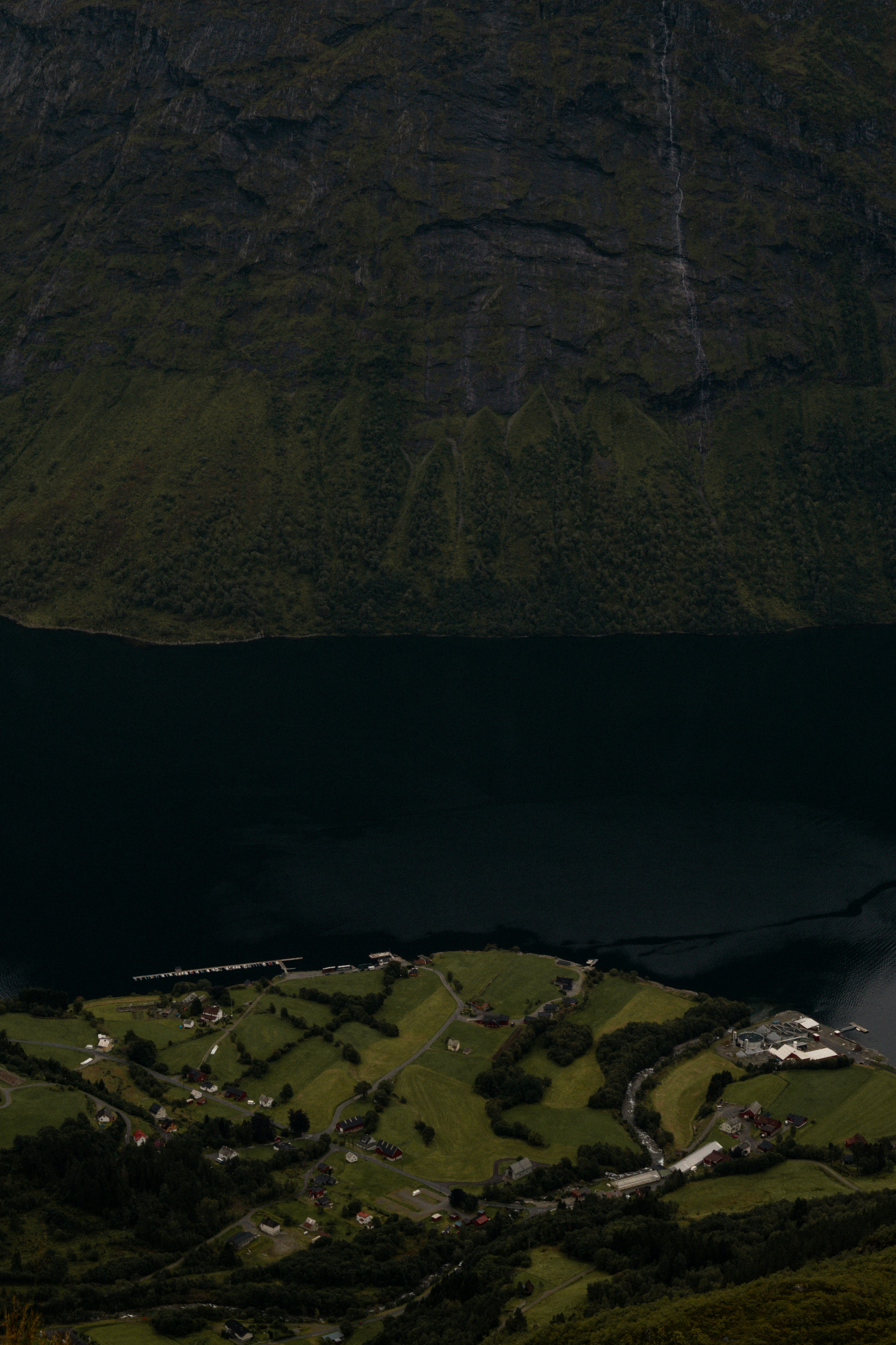 A large body of water surrounded by mountains