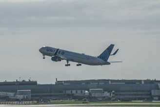 An airplane taking off from an airport runway