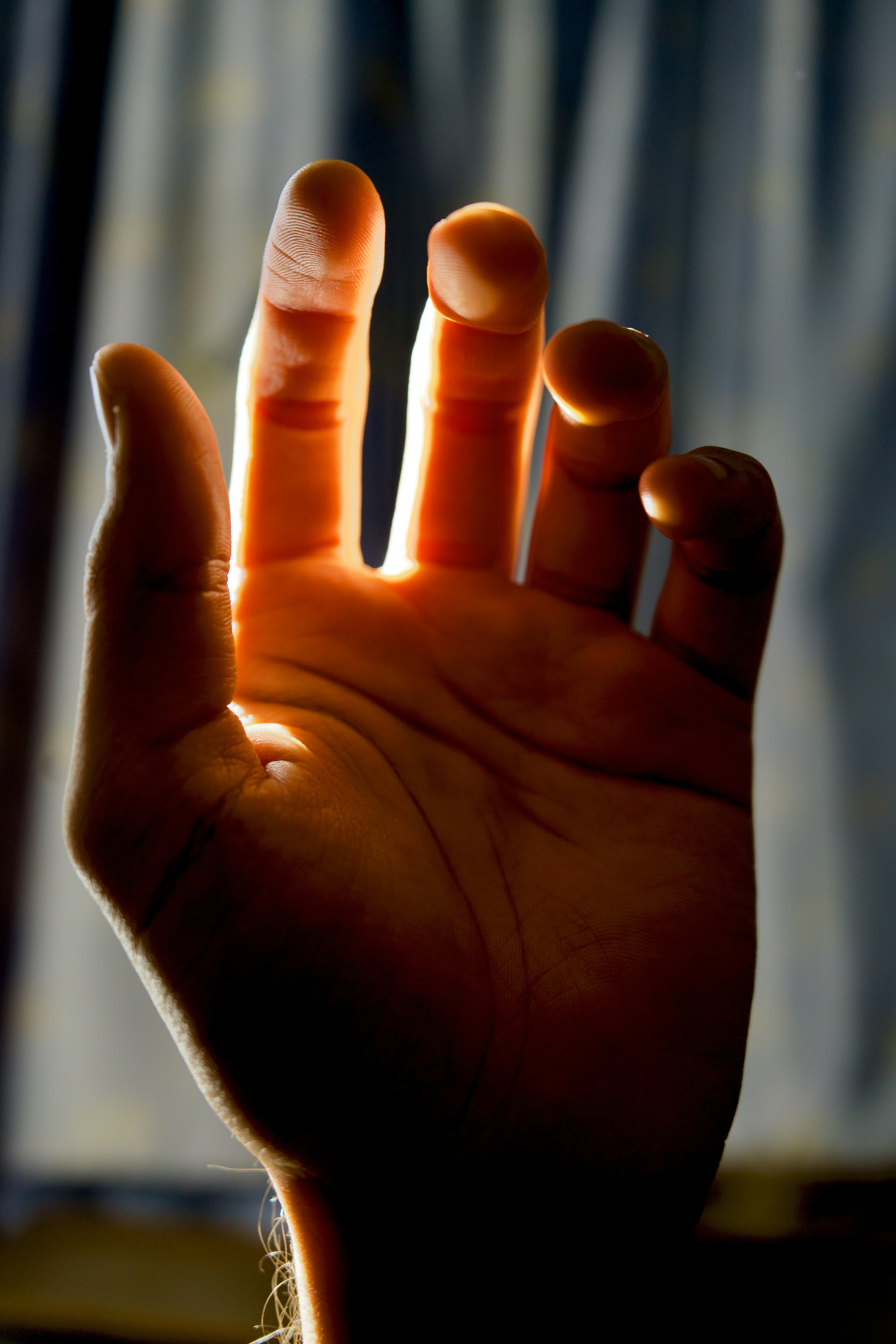 Hands holding a glowing light