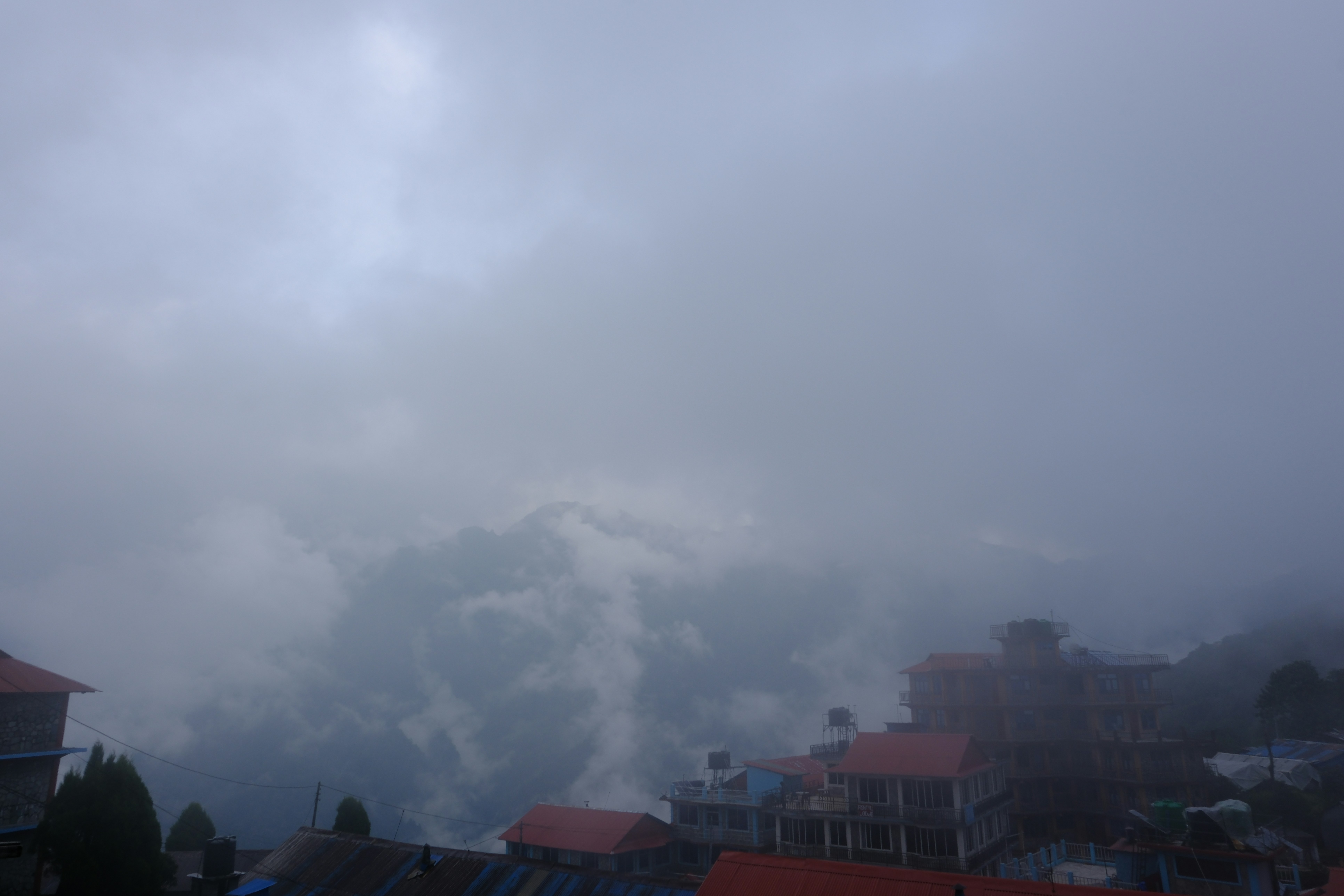 A view of a cloudy sky over a city