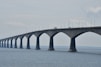 A long bridge spanning over a large body of water