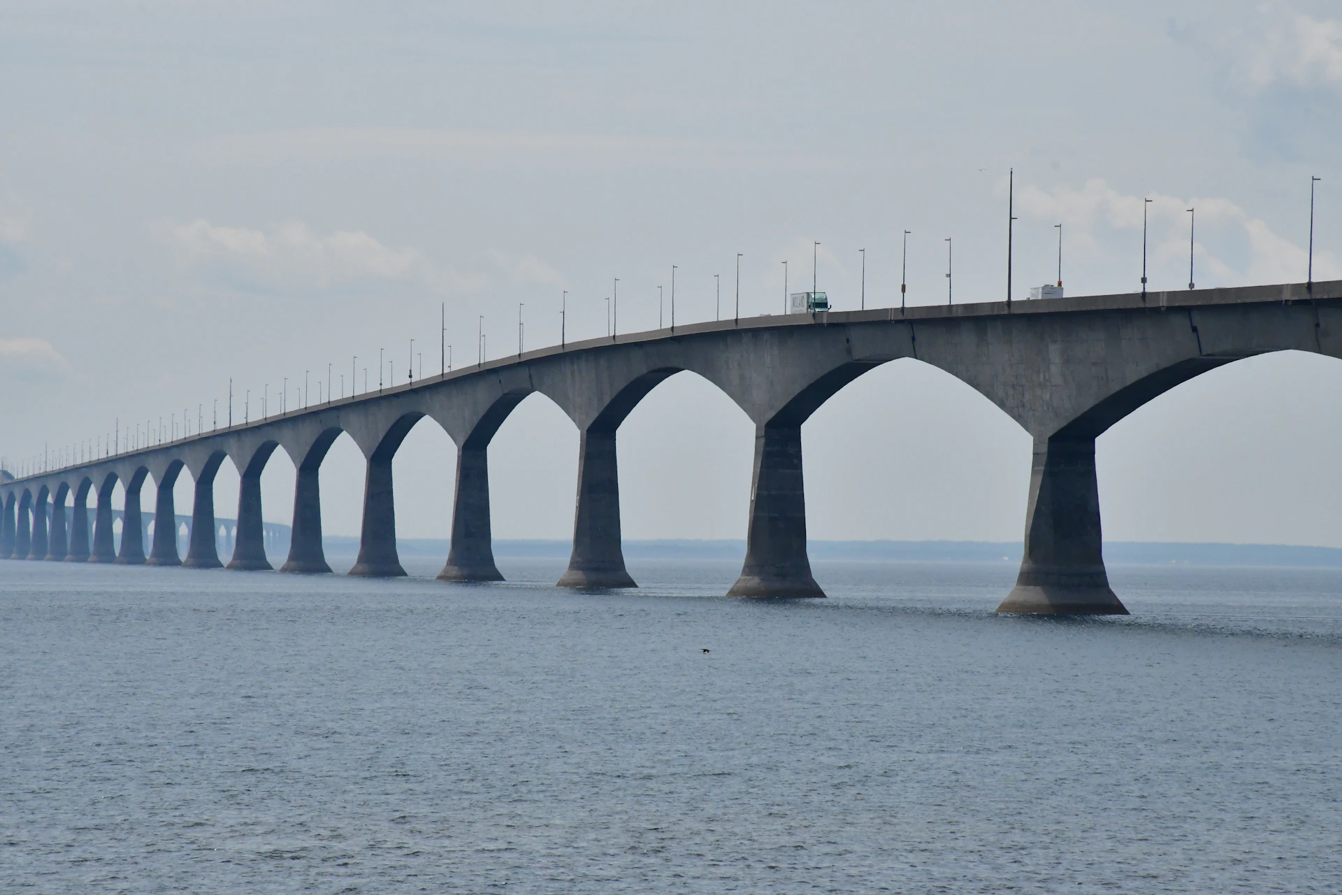 A long bridge spanning over a large body of water