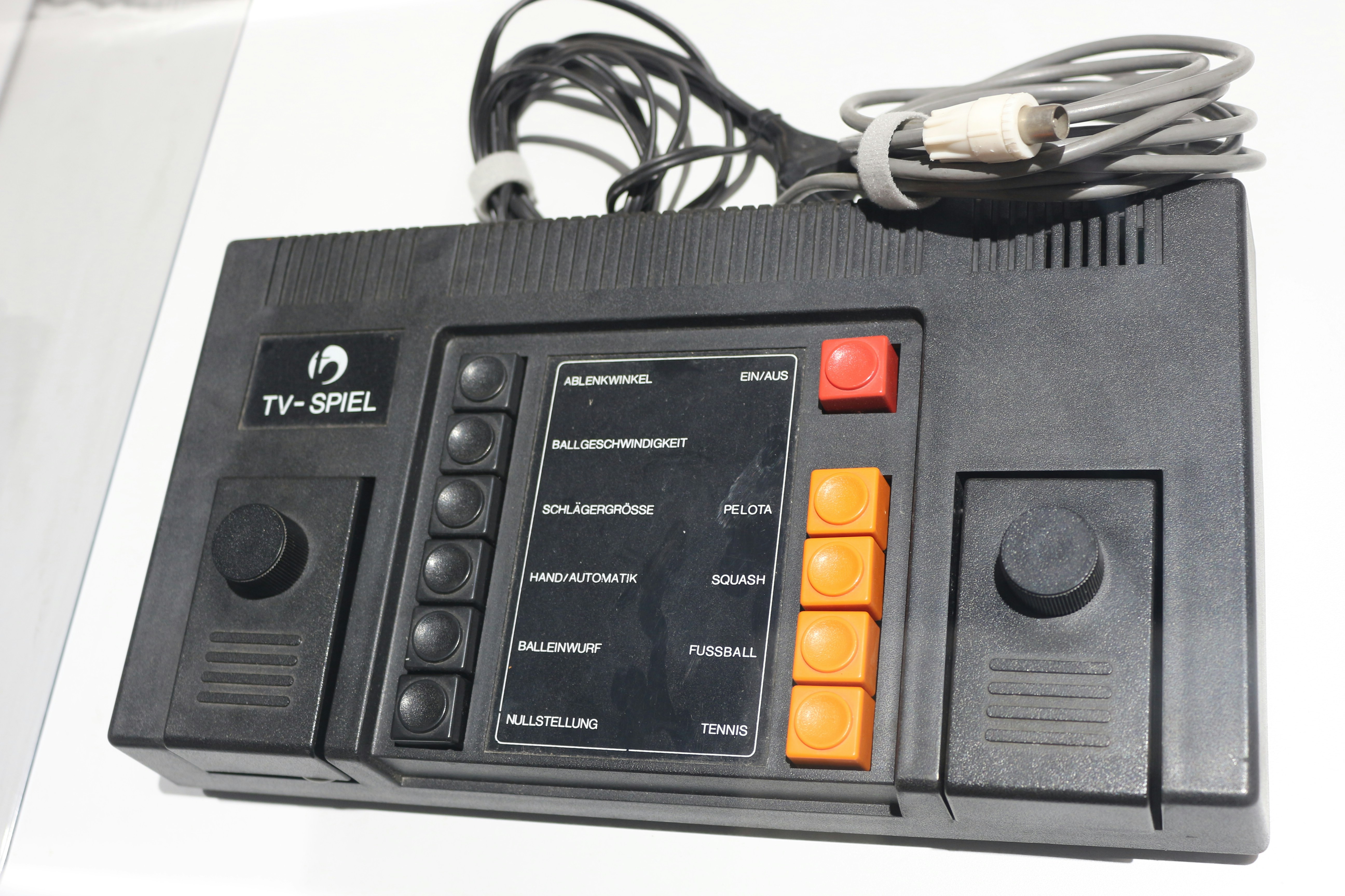 A control panel with wires and cords attached to it